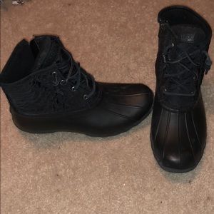 Black Sperry duck boots.